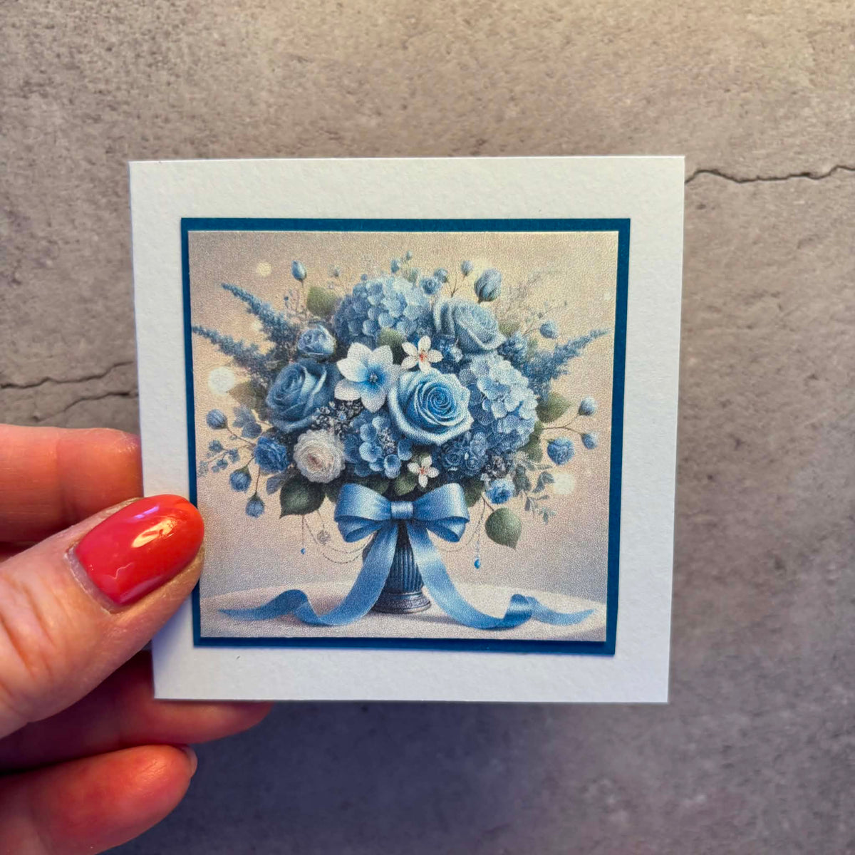 Kort med blomsterbukett